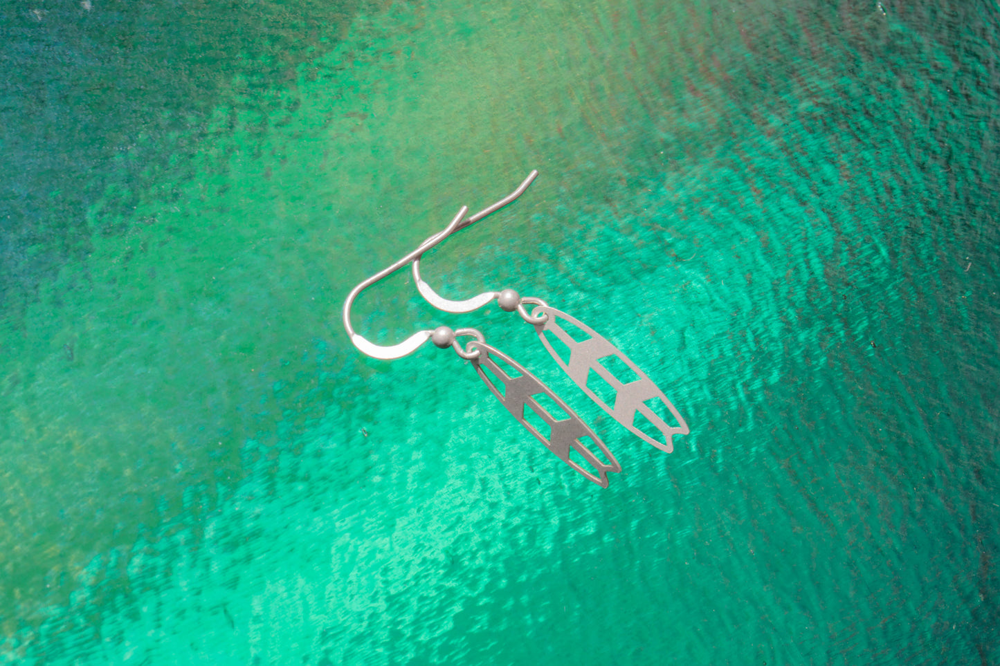 surf inspired sterling silver earrings made in cornwall